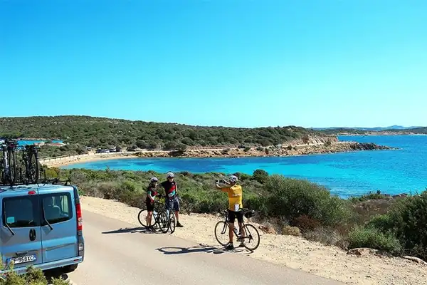 Private support van and cyclists on the Costa Smeralda coast